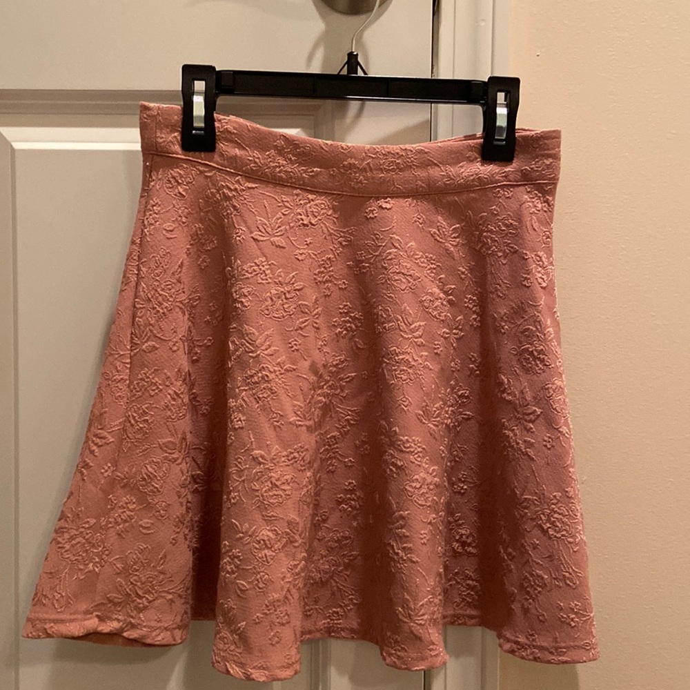Pink skater skirt.